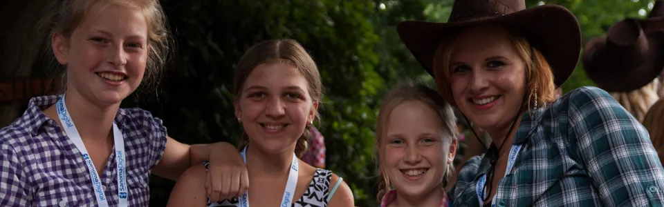 Deelnemers met cowboyhoeden